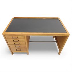 Gordon Russell - Oak pedestal desk with black leather inset top, rectangular galleried back, five graduating drawers, tubular metal handles and stretcher on square supports