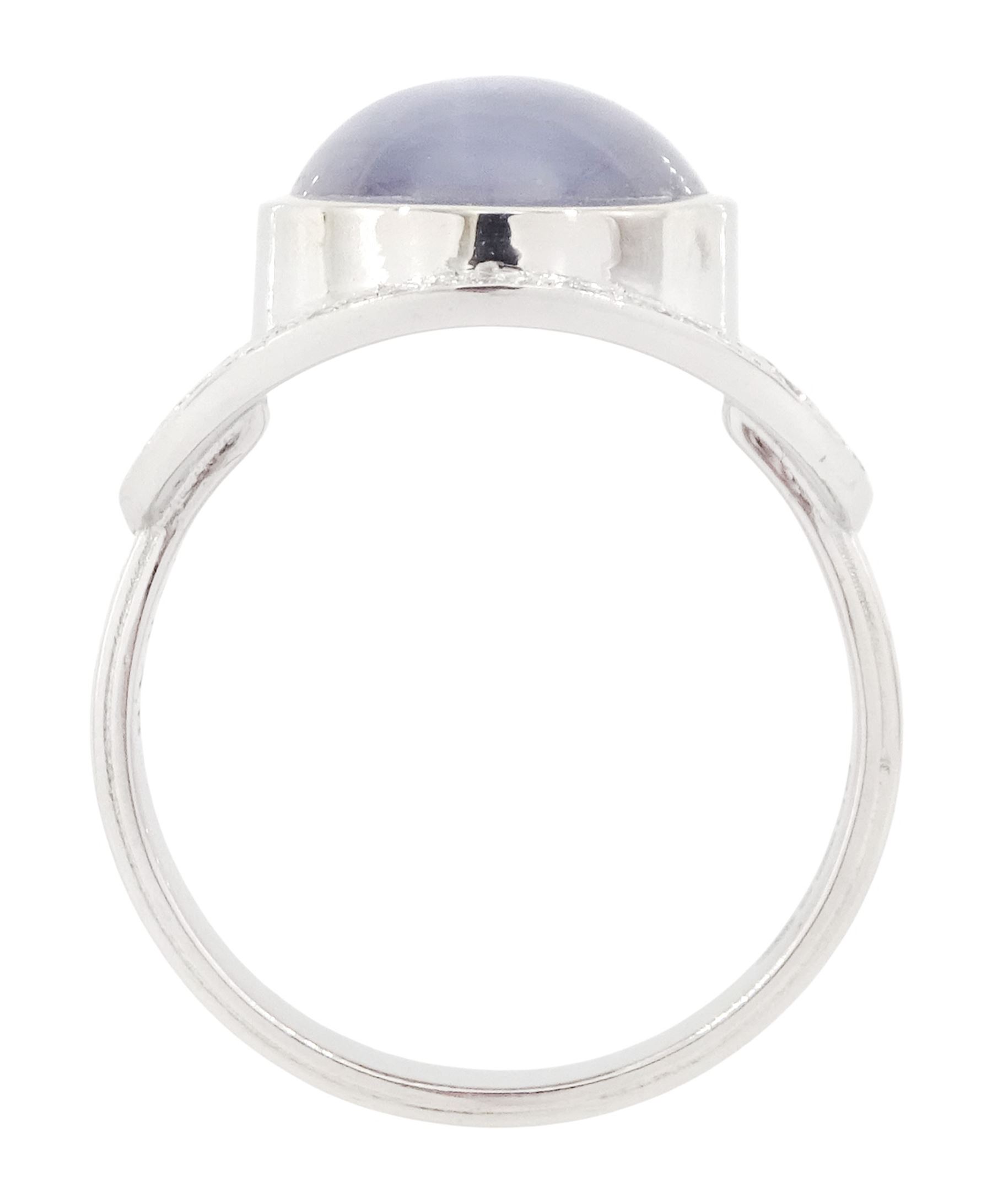 Platinum star sapphire and diamond ring by Scarab London, single cabochon cut sapphire of approx 8.17 carat, with sunburst design surround set with round brilliant cut diamonds, to a plaited design shank, London 2024, total diamond weight approx 0.50 carat, with Alan Poultney Gems report