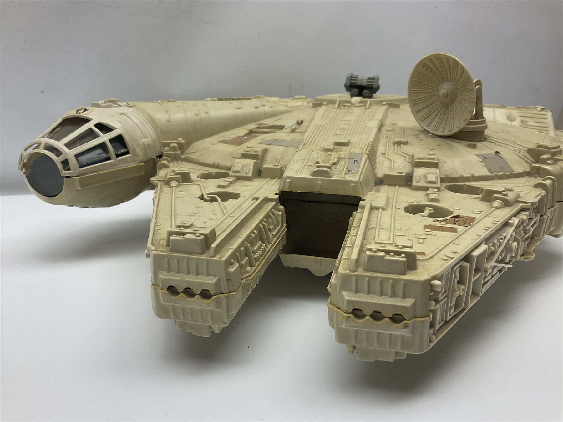 Star Wars - two unboxed vintage Star Wars vehicles comprising Millenium Falcon with 3 3/4