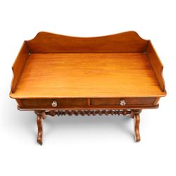 Victorian mahogany washstand with raised three-quarter back, fitted with two frieze drawers with glass handles, raised on spiral turned supports with splayed supports and castors united by barley-twist stretcher