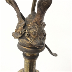  Victorian brass standard lamp, the oil reservoir converted to electric supported by three cast dolphins, telescopic adjustable column with serpentine supports, tripod base each with dolphin terminal, central cast foliage mount, stamped 'Townshend' underneath the base, H150cm (including shade)  