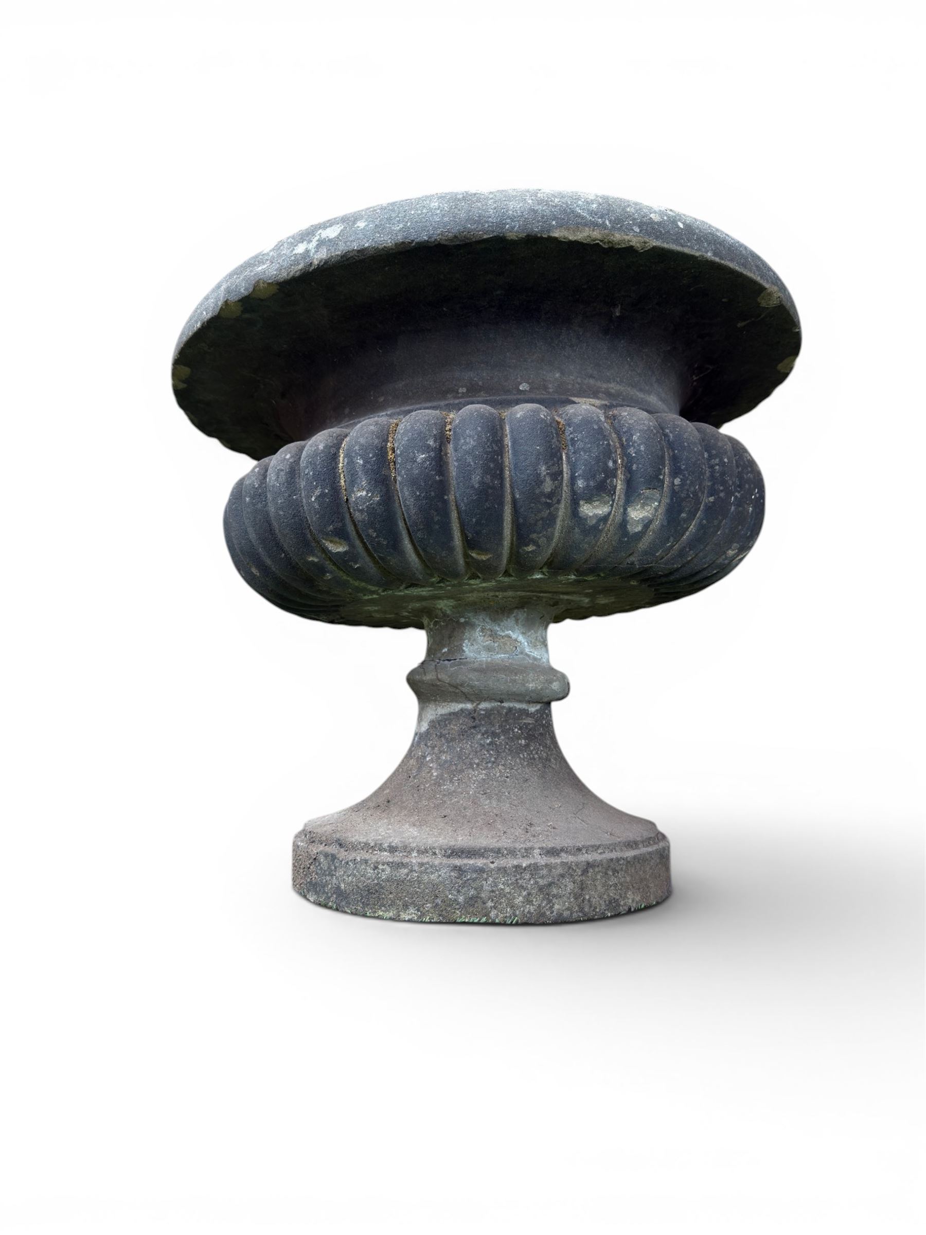 Carved sandstone garden urn, gadrooned campana form