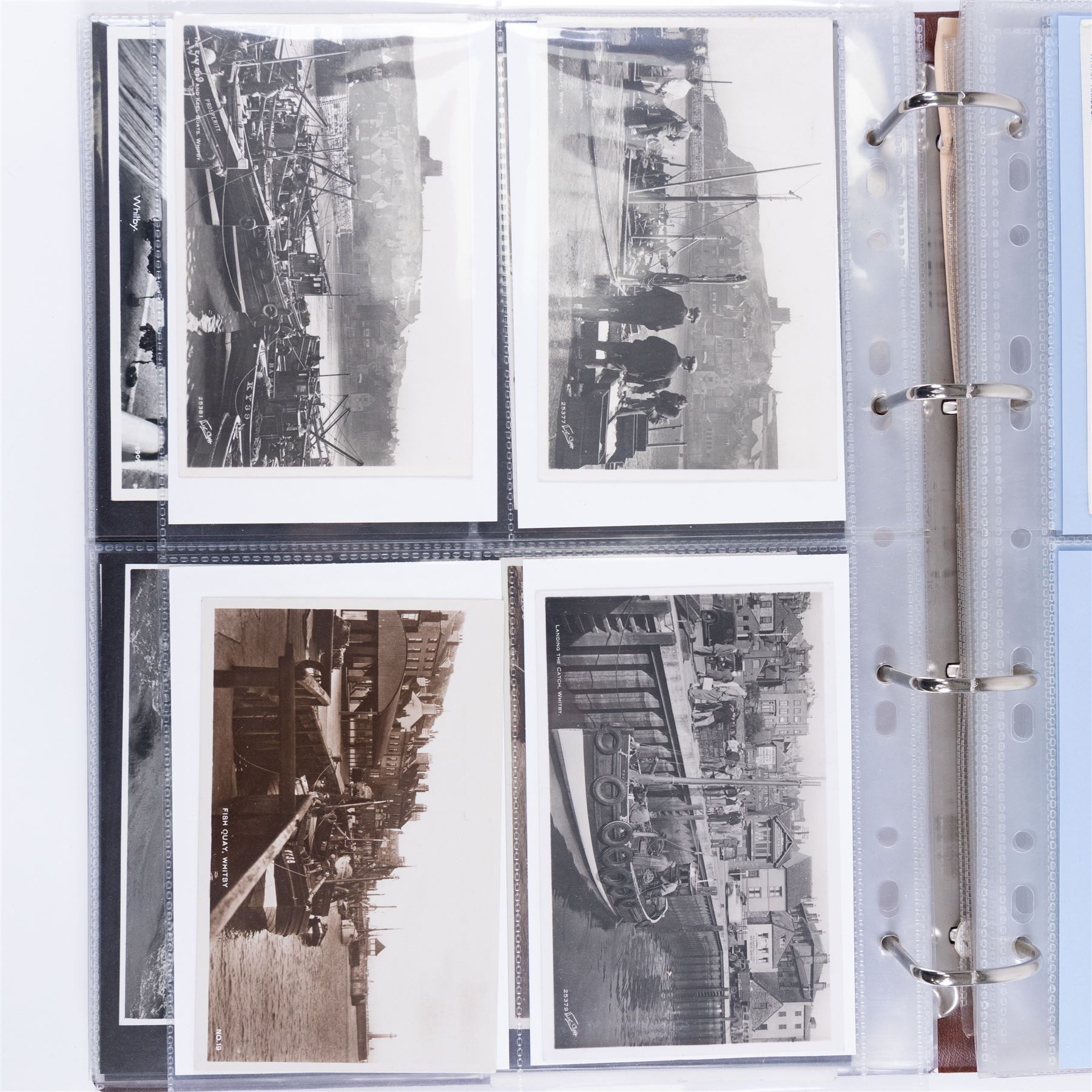 One-hundred and seventy two early 20th century Whitby view postcards, including a detailed collection documenting the destruction of Whitby following the bombardment by the German Fleet in 1914, a selection depicting the construction of the pier extensions, the opening of the new river drawbridge, a re-enactment of the medieval tradition of building the 'Penny Hedge' and the 1932 flooding of the town centre, together with a selection depicting social events at Spa, all housed within a Stanley Gibbons Picture Postcard Album