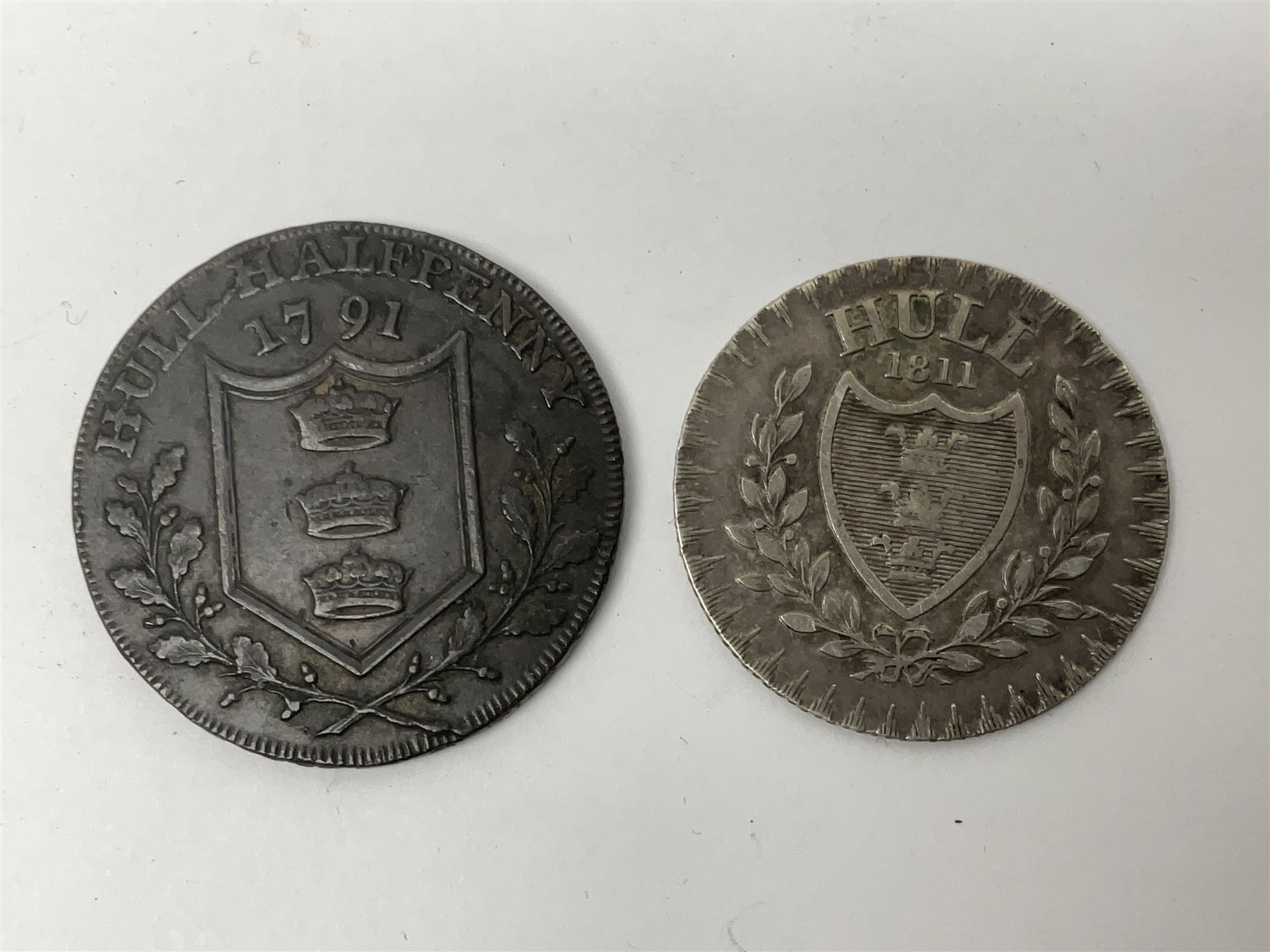 Collectables, to include enamelled Gothic Florin, Hull Rudston and Preston 1811 one shilling six pence token, silver gilt Hull Airedale Terrier Club fob, silver and tortoiseshell badge inscribed East Yorkshire beneath Yorkshire Rose, polychrome enamel buckle, mother of pearl badge carved with rose and tiger and inscribed York & Lancaster, etc.