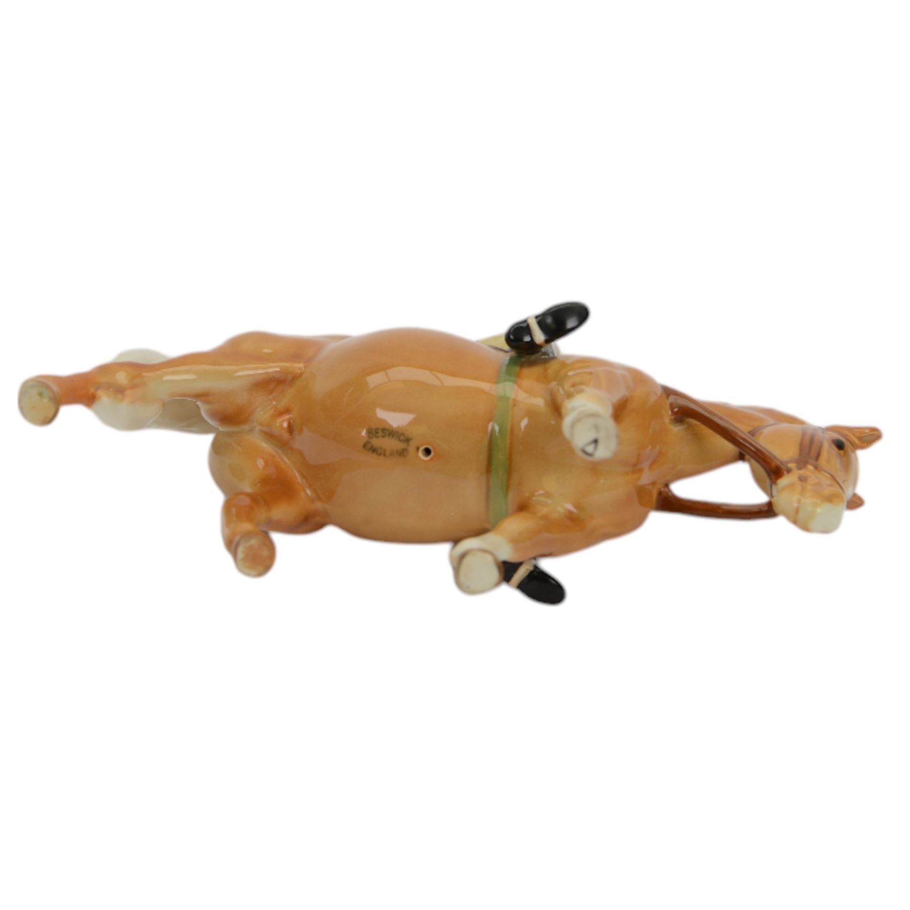 Two Beswick figures, comprising Boy on palomino pony no 1500 and Thelwell Angel on Horseback