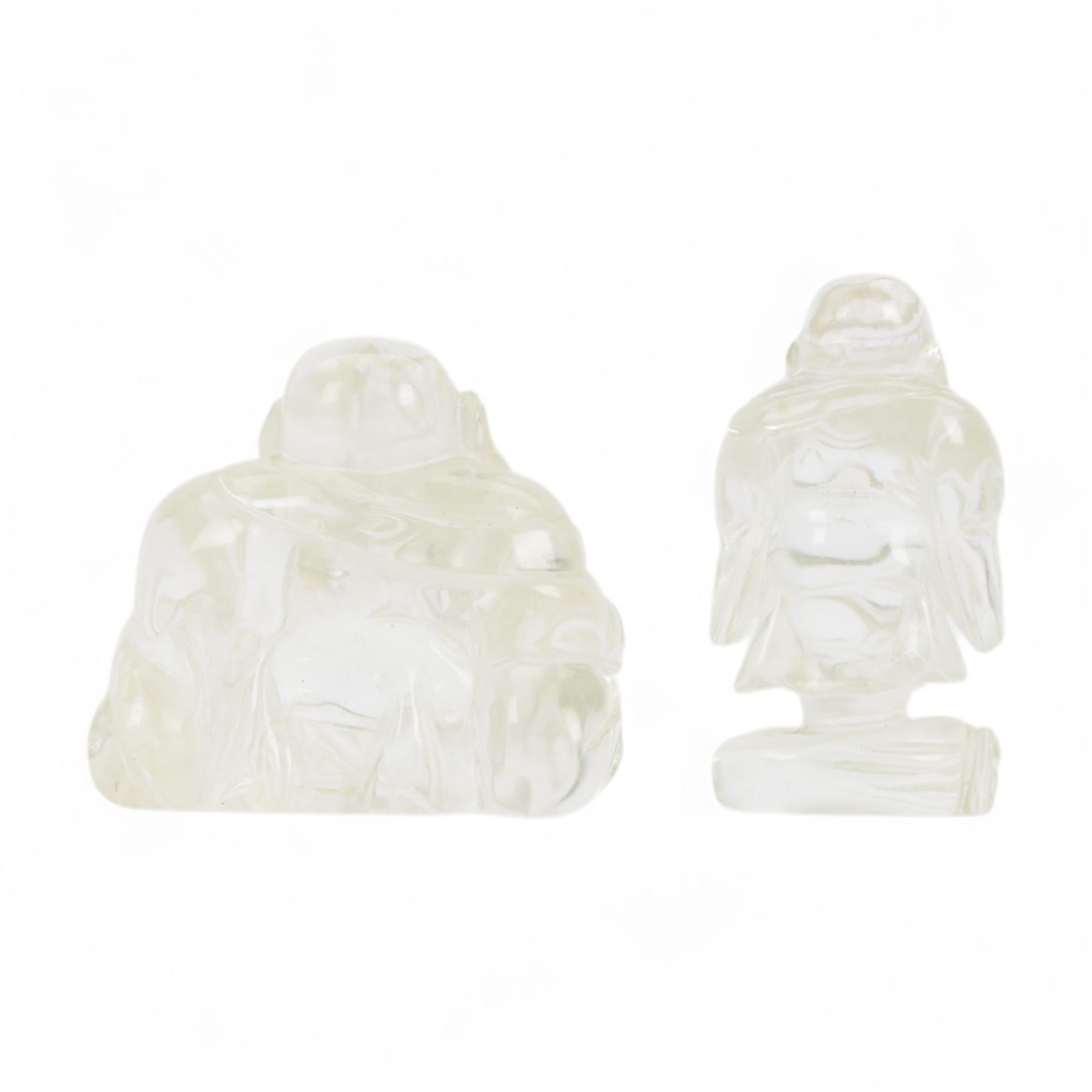 Two clear quartz figures of Buddha, together with five resin figures, including pair of zodiac balls, ram and Buddha, tallest H13cm