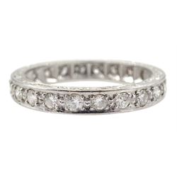 Mid 20th century white gold round diamond full eternity ring, twenty-two diamonds, with engraved decoration to the sides, stamped 18ct