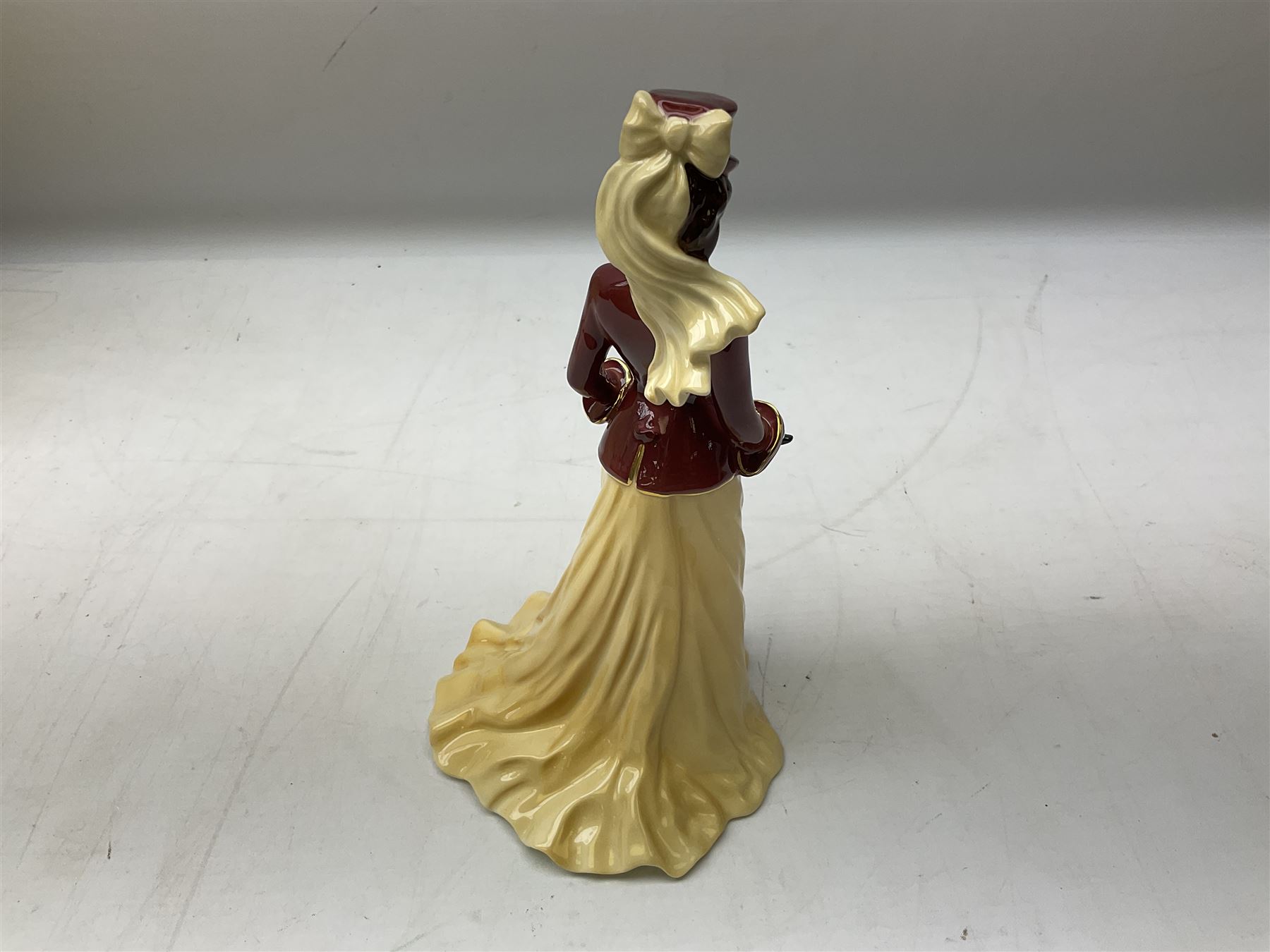 Two limited edition Coalport Sporting Pastimes figures, comprising The Rider and The Skater, both boxed with certificates