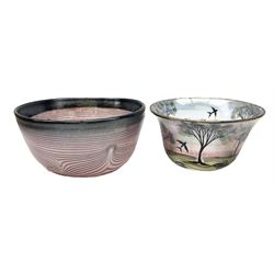 Two Eisch studio glass bowls, the first example hand painted with a landscape of trees, the second example decorated with black spirals upon a pink ground, each marked beneath, tallest example H6.5cm