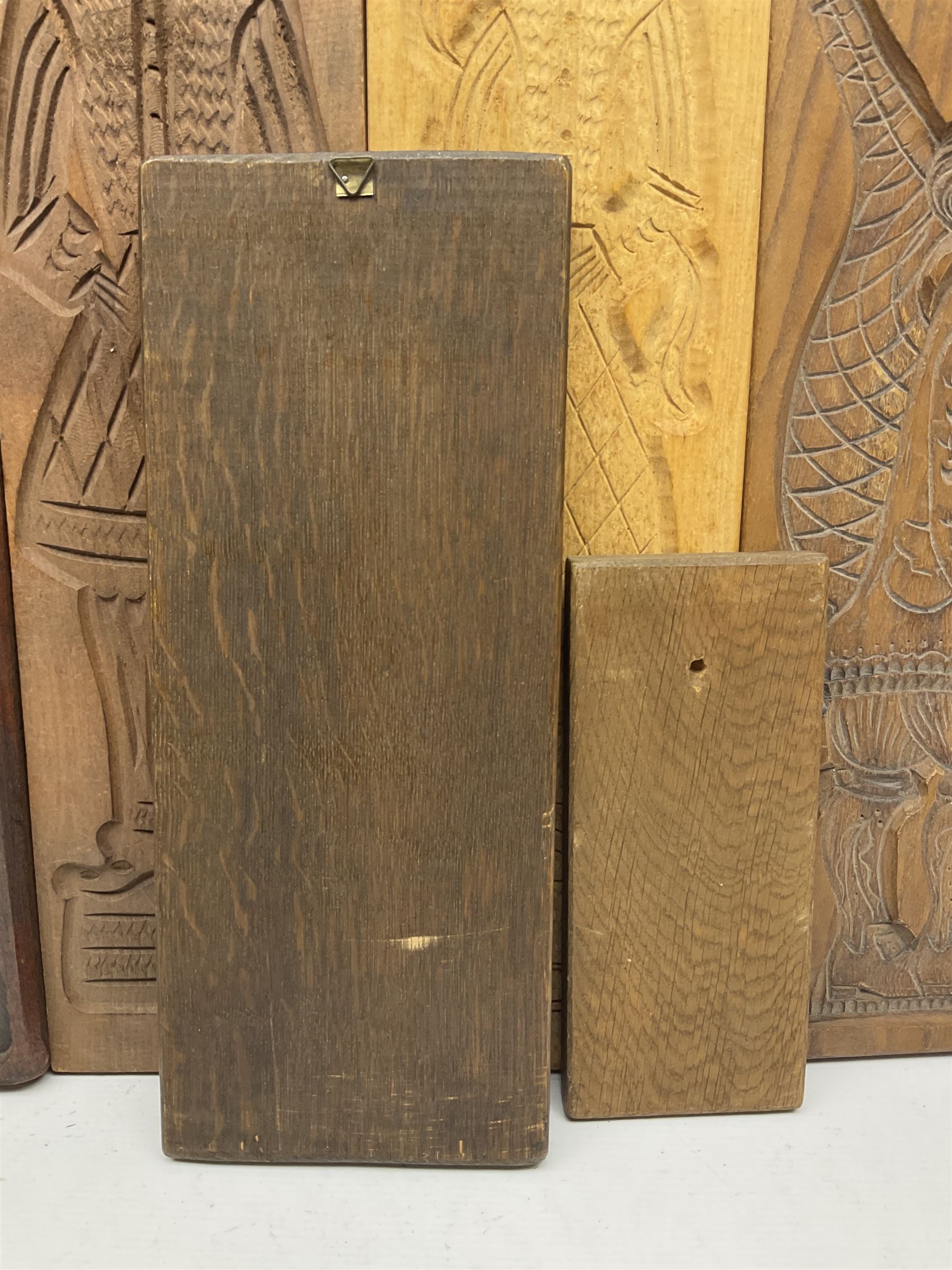 Eight 20th century hardwood Dutch folk art Speculaasplank or biscuit moulds, most examples typically carved with figures in traditional dress, tallest H60cm