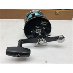 Four Abu fishing reels, comprising Ambassadeur 9000, Ambassadeur 7000, Ambassadeur 5500 and Ambassadeur 6500, together with additional line, hardy fishing bag and two wooden boxes