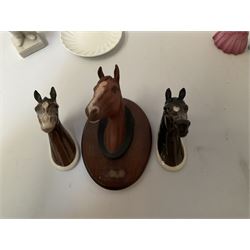 Beswick horses head wall plaques comprising Hunter 1382 and Arab 1385 and another on wood plinth, Beswick Siamese cat, two Coalport figures, Goebel figure etc