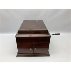 Early 20th century wind up gramophone set in a wooden case with twin door sound hole to the front and tins of 'His Masters Voice' needles