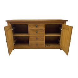 Solid oak sideboard, fitted with four drawers and two cupboards