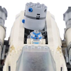 Three Lepin Star Wnrs built models, comprising Red Five X-Wing Starfighter no. 05039, Millennium Falcon no. 05132 and Super Star Destroyer no. 05028