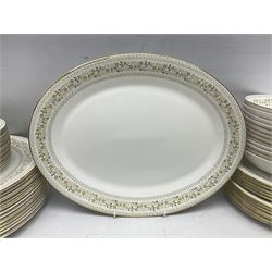 Royal Doulton Paisley pattern tea and dinner service for twelve, comprising dinner plates, side plates, soup bowls, dessert bowls, tea plates, two lidded tureens, sauce boat and saucer, sucrier and jug, oval serving dish and teacups and saucers