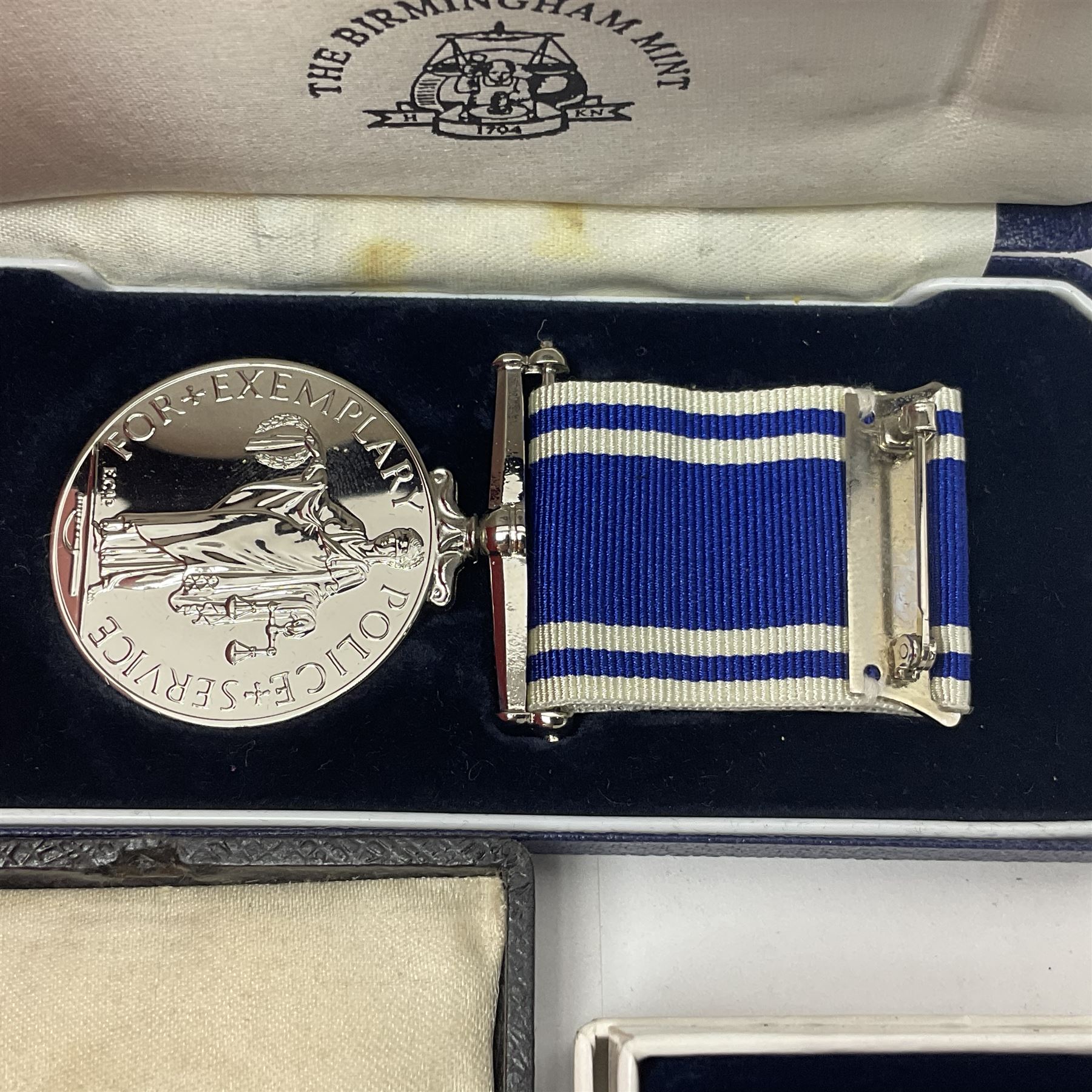 Medals, medallions and fobs including Queen Elizabeth II 'Golden Jubilee Medal 1952-2002', The Birmingham Mint 'Long Service and Good Conduct' medal, various modern medals etc. 