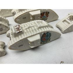 Twelve crested china models of WW1 tanks by Grafton, Arcadian and Carlton china etc with crests from Caistor Lincs, Saffron Walden, Paignton, Evesham etc  , together with a crested china model of the R.M.S Lusitania with New Brighton crest and a two-handled vase for 'The Forts Boxhill' (14)