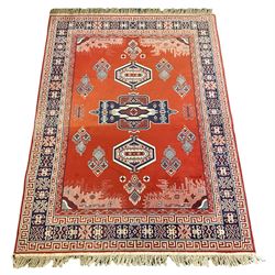 Turkish design rug, red ground and decorated with geometric pattern (192cm x 141cm), and a runner (200cm x 81cm)