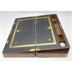 A 19th century walnut writing slope, the hinged cover with vacant brass cartouche opening to reveal a fitted interior with gilt tooled leather slope, L44.5cm D24.5cm H17cm.  