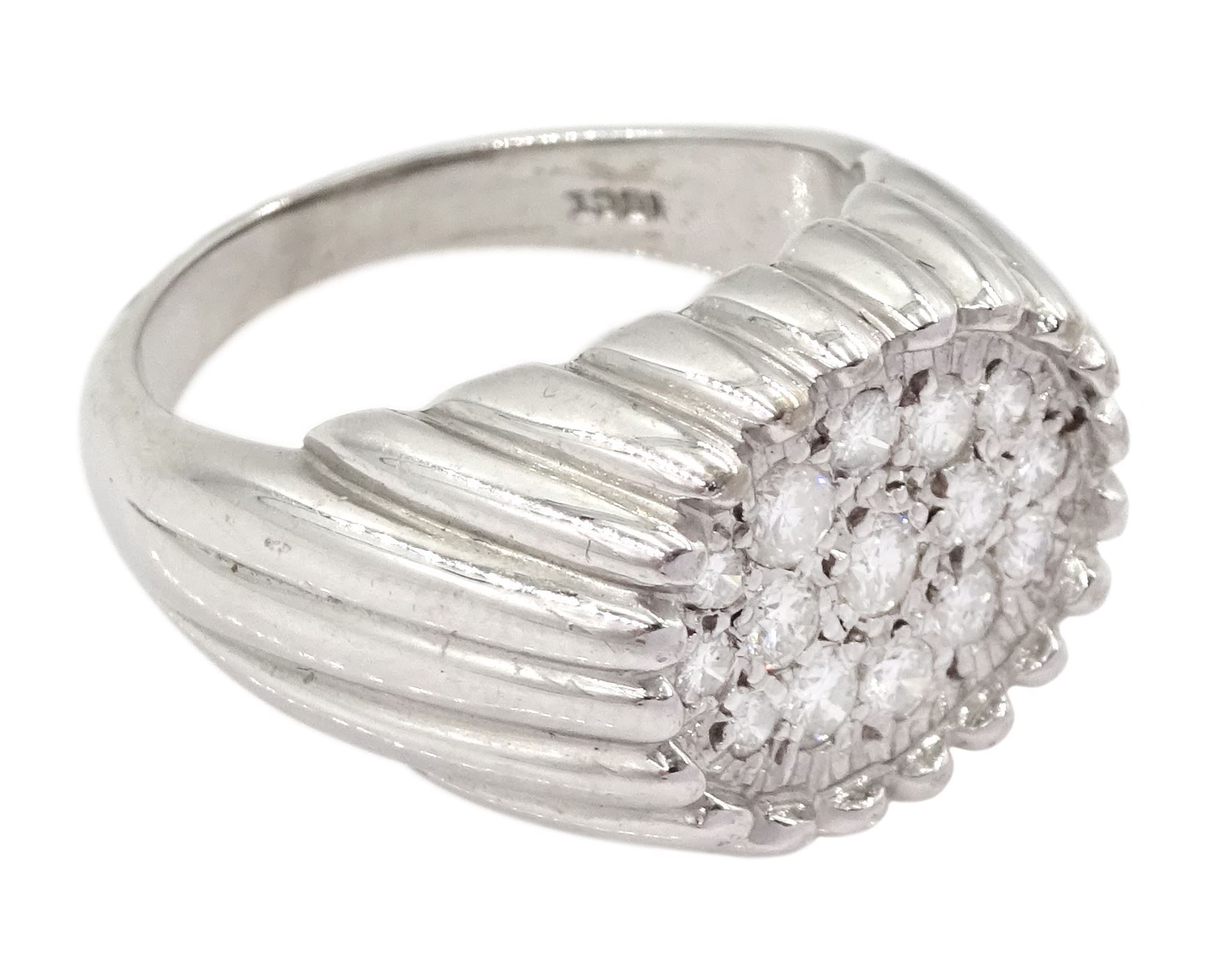 White gold diamond ring, fifteen pave set round brilliant cut diamonds, in an oval setting, stamped 18ct, total diamond weight approx 0.70 carat