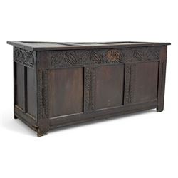 18th-century carved oak blanket chest with hand-carved floral and leaf motifs 