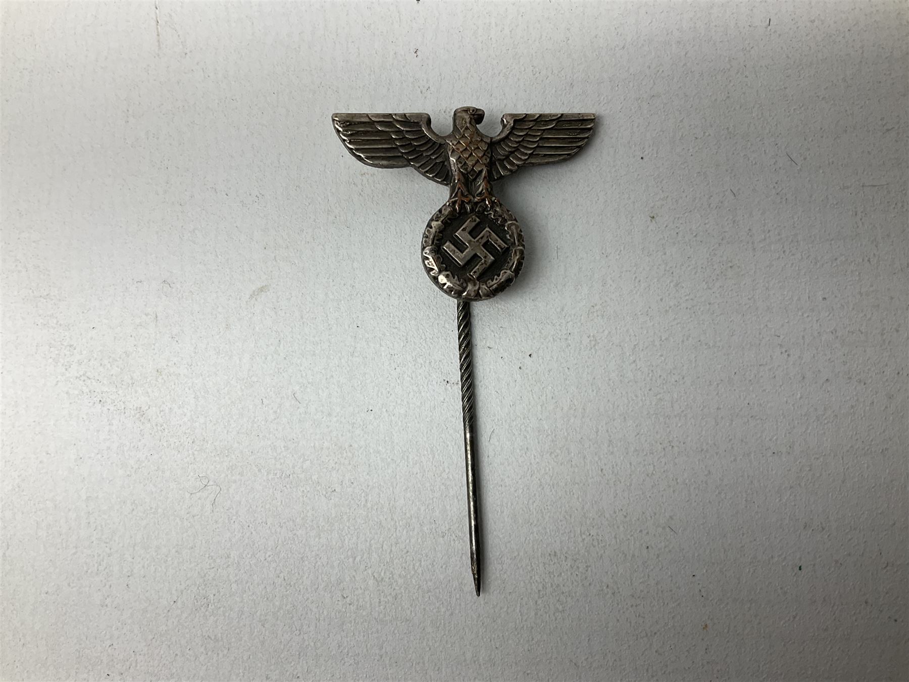 Nine WW2 German lapel pins including five Infantry Assault, Tank Assault etc 