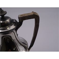 1930's silver hot water pot, of faceted baluster form with engraved dedication, and wooden handle and finial, hallmarked Harrison Brothers & Howson, Sheffield 1930, H20cm, approximate gross weight 15.66 ozt (487.2 grams)