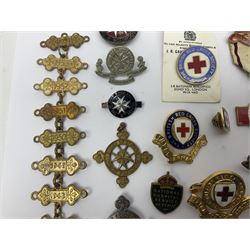 Collection of St John Ambulance enamel and metal badges, together with Red Cross medals and badges