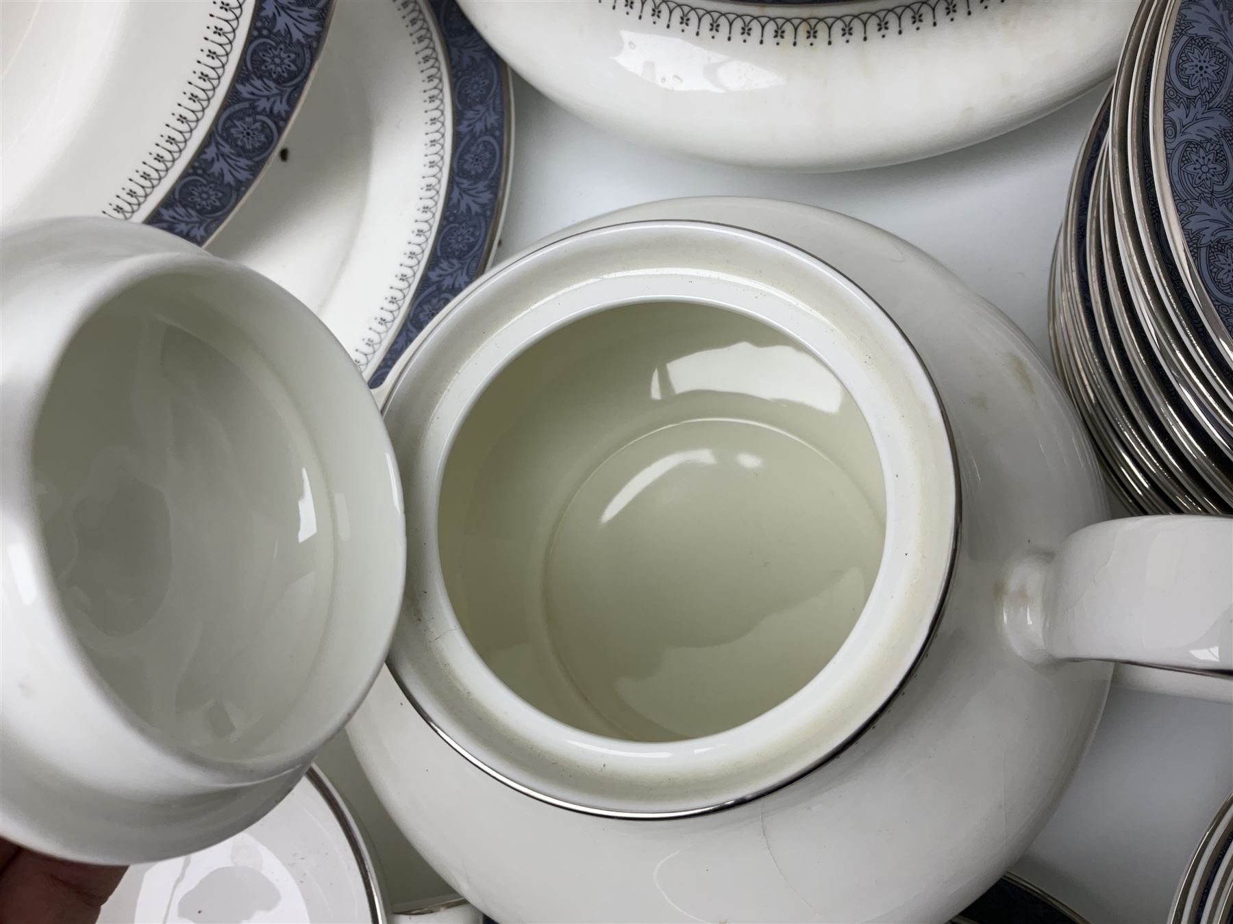 Royal Doulton Sherbrooke pattern part dinner and tea service, to include teapot, ten twin handled soup bowls and saucers, two serving platters, three twin handled covered dishes etc (63)  