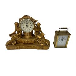 Two quartz battery operated clocks and a Smiths spring wound globe clock.