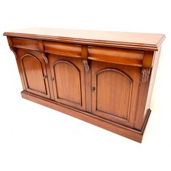 Waring & Gillow - cherry wood sideboard, three drawers above three cupboards, skirted base