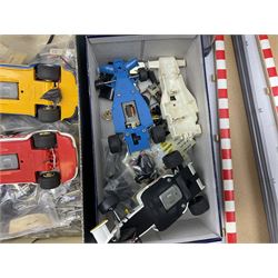 Scalextric - John Player Special racing car; boxed; two C125 Porsche cars; C135 Tyrrell 008 racing car; Honda racing car; all unboxed; quantity of unused and used spare parts including motors, wheels and other accessories etc