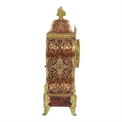 Louis XV-style gilt-bronze mounted turtleshell boulle mantel clock, the case of typical waisted form, gilt bronze foliate scroll and rocaille mounts, raised on scroll feet. Eight-day Paris movement signed “Rollin à Paris”, with outside count-wheel striking half-hourly on a single bell, the going train with anchor escapement. The circular foliate gilt bronze dial with enamelled Roman hour numerals and twin winding apertures, fitted with pierced blue steel hands and bevelled glass cover, with pendulum and key, circa 1860