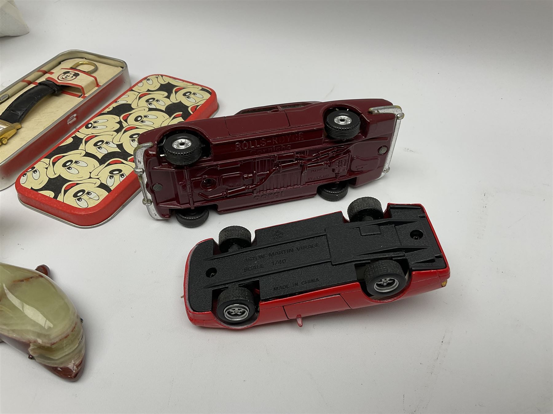 Onyx chess set, W21cm, Mickey Mouse watch in tin, Corgi Rolls Royce Corniche model, Aston Martin model and an onyx dolphin figure 