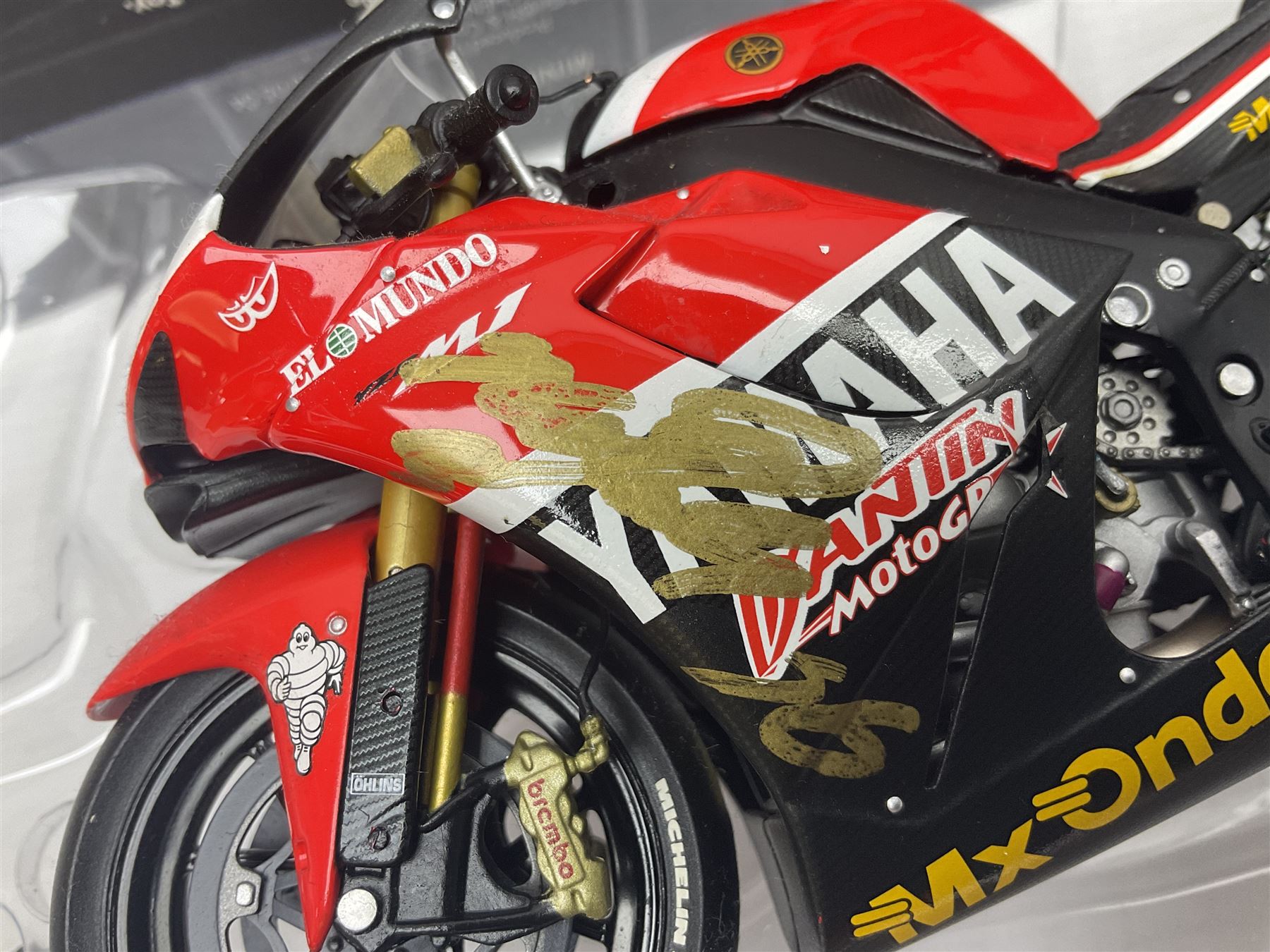 Four Minichamps 1:12 scale die-cast motorcycles - Honda RC211V Team Movistar Honda MotoGP Rider Marco Melandri MotoGP 2005; Yamaha YZR-M1 Antena 3 Yamaha D'Antin Shinya Nakano MotoGP 2003; Yamaha YZR-M1 Max Biaggi MotoGP 2002; and Ducatti 999FO4 Gregorio Lavilla BSB 2005; all boxed (4)