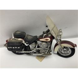 Franklin Mint - three die-cast models comprising 1:10 scale Harley Davidson Heritage Softail motorcycle, 1:24 scale 1957 VW Beetle and 1:24 scale 1993 Rolls Royce Corniche IV; all unboxed (3)