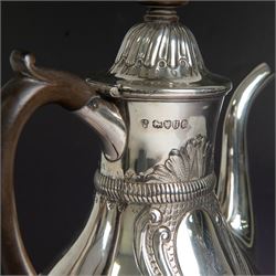 Victorian silver coffee pot, of part fluted baluster form, with central oval cartouche engraved with peryton crest, bordered by C scrolls and chased scales, with impressed acorns, stars and leaves throughout, with wooden handle and finial to domed hinged cover, hallmarked Charles Stuart Harris, London 1883, H23cm