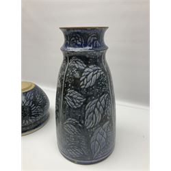 Studio pottery vase, decorated with leaves on a mottled blue/grey ground, together with a similar planter, tallest H37cm