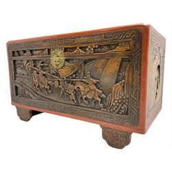 Mid-20th century Singapore camphor wood blanket chest, heavily carved depicting battle scenes and cityscapes 