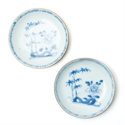Pair of 18th century Chinese blue and white ‘Nanking Cargo’ saucer dishes painted with bam...