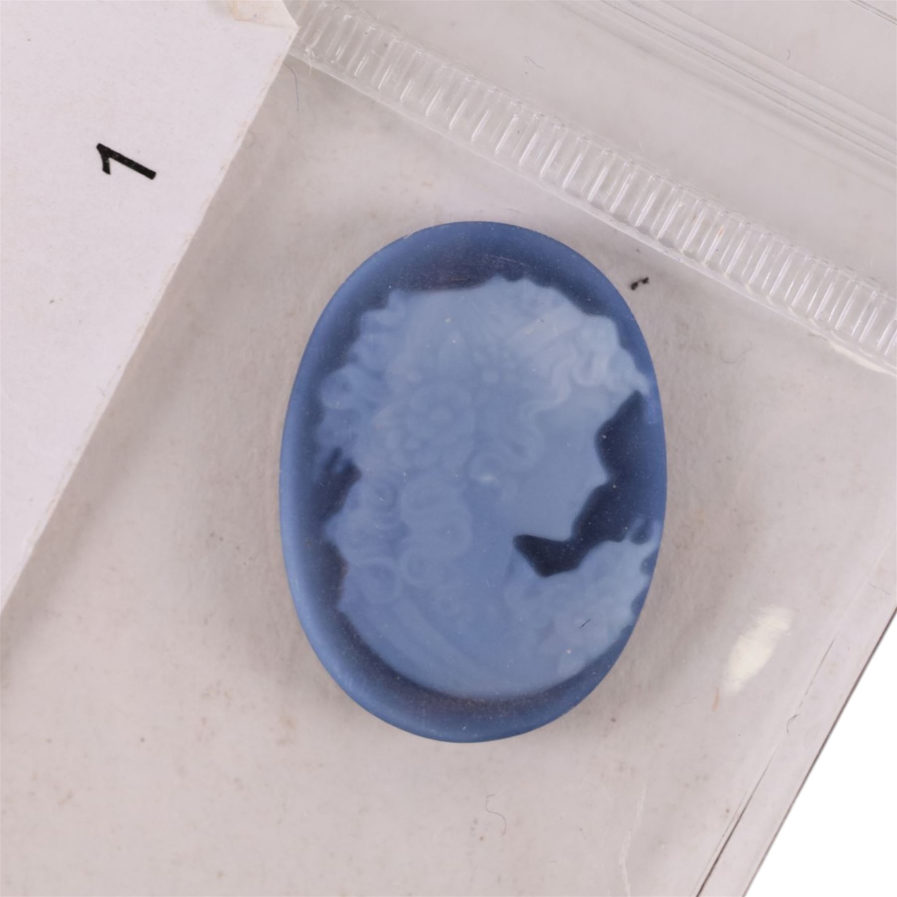 Blue agate cameo depicting a young girl and two haematite warrior intaglios, largest H21mm