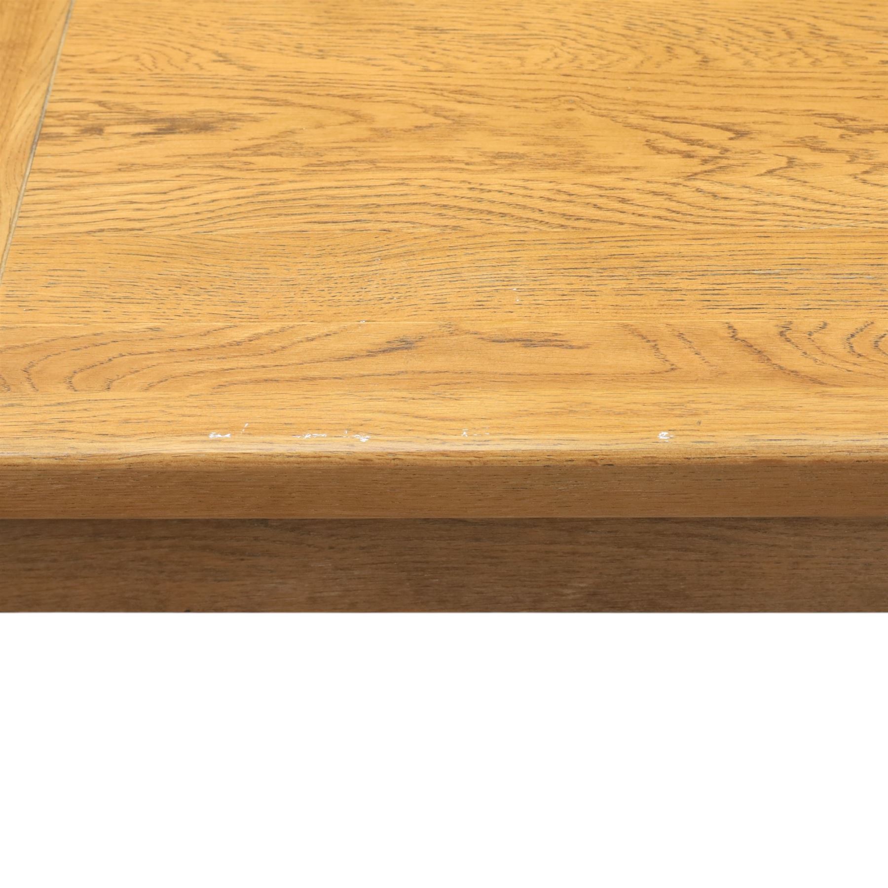 Contemporary oak extending dining table, moulded rectangular top with visible grain and inset extension leaf, pull out extending mechanism, standing on four square legs, accompanied by a set of high slat back chairs with upholstered brown faux leather seats and square tapering supports joined by stretchers