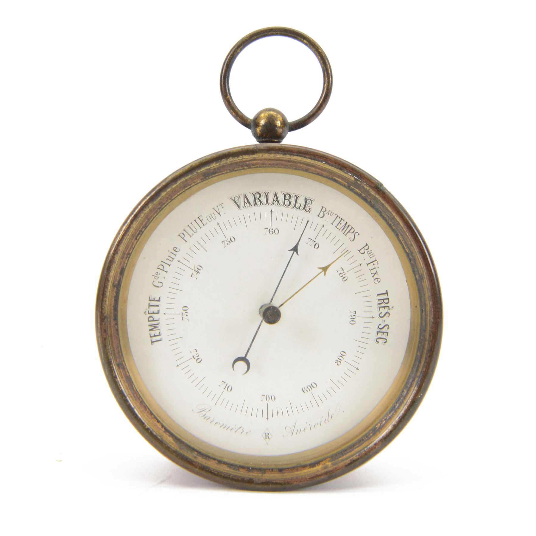 French- late 19th century desktop aneroid barometer in a circular gilt metal case with carrying ring, 3.5 inch paper printed register with predictions and barometric air pressure, with a steel indicating hand and brass recording hand, adjustment screw to the rear.