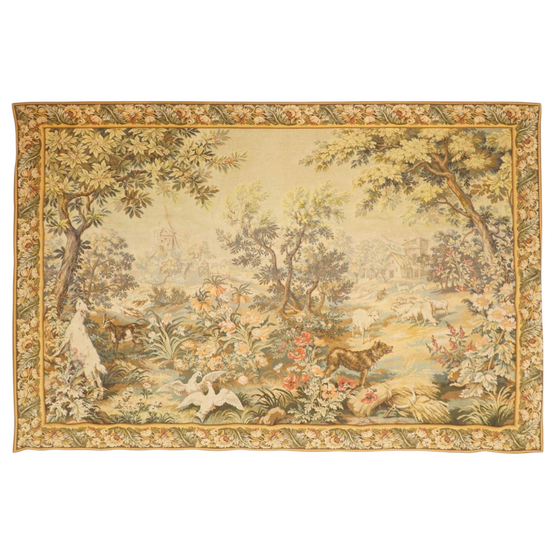 Large French Aubusson style verdure tapestry, of 18th century design but later, depicting rural scene with goats, 155cm x 210cm