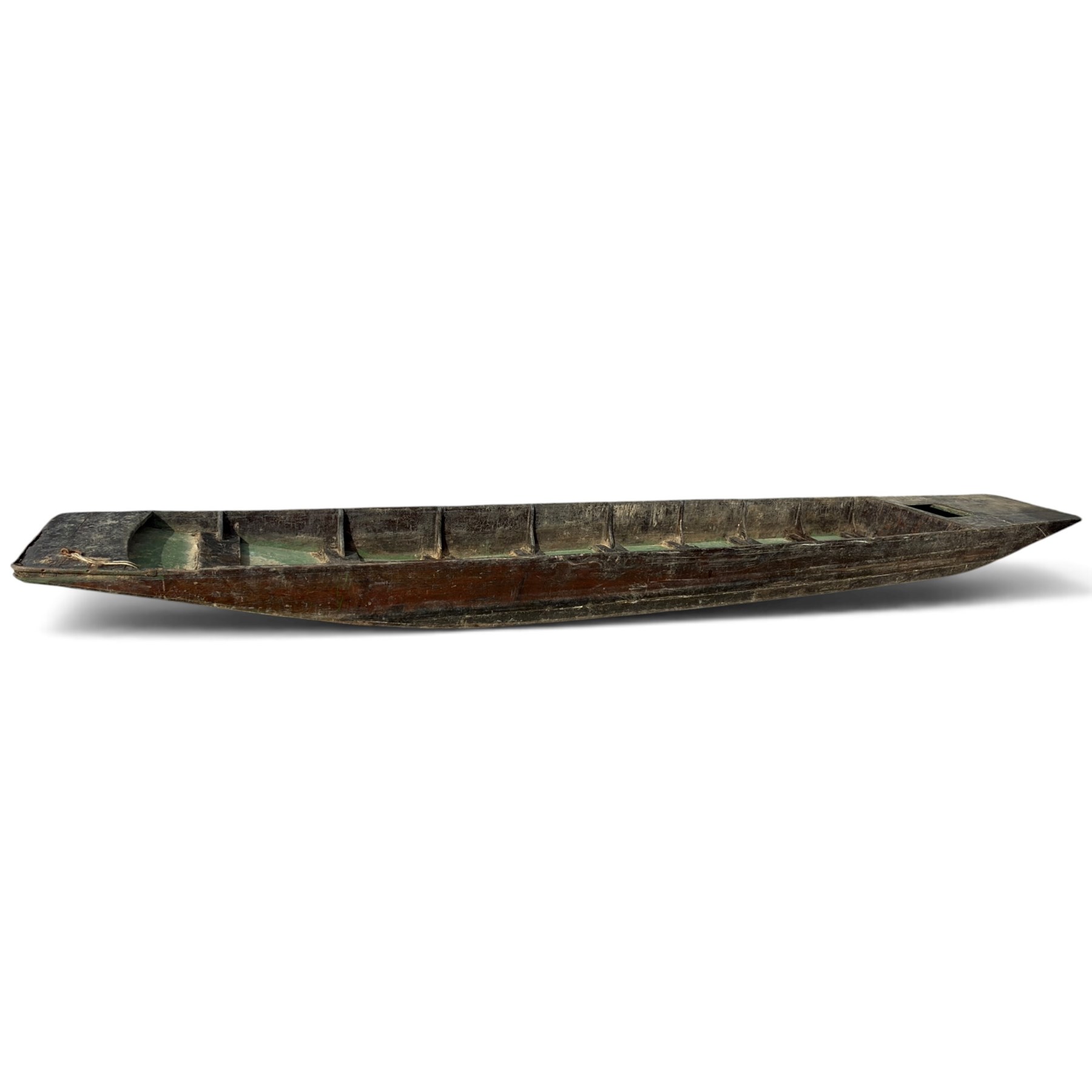 Large early 20th century plank-built wooden river punt, the long tapering hull with enclosed fore and aft decks, open green-painted ribbed interior, together with two paddles