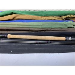 Twelve carbon fiber fishing rods in cloth covers, to include Normark fishing rod, Daiwa Carbon C98 etc (12)