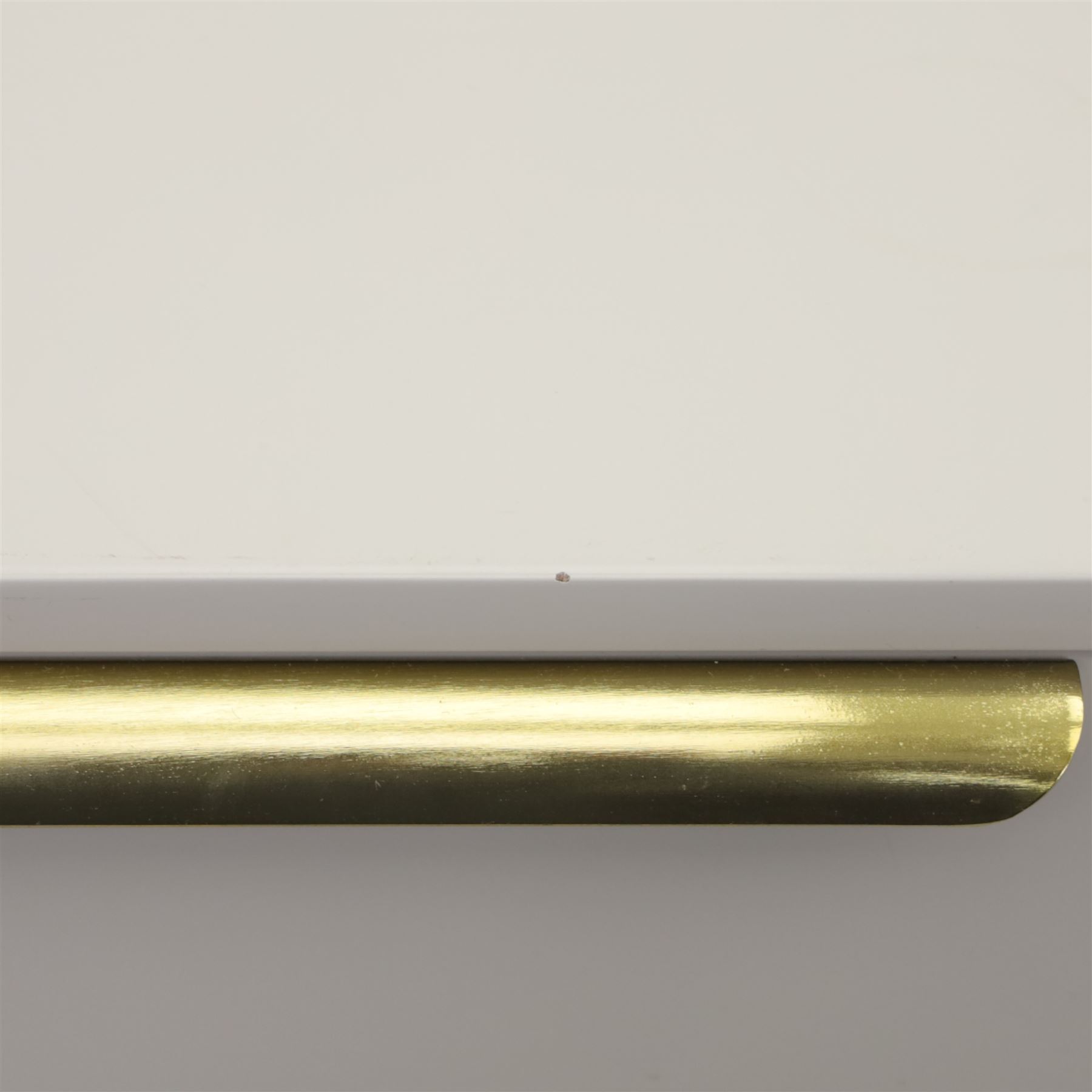 Made.com - 'Ebro' grey four drawer chest, gold painted metal shaped handles, rounded corners with fluted detail, raised on gold painted metal tapered supports