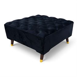 Late 20th century pair of Empire inspired brass metal framed two-seater sofas, upholstered in black velvet with cylindrical backrest and sphinx form arms terminating in paw feet, together with matching deep buttoned black velvet footstool on brass capped legs (Footstool H 38cm, W 70cm, D 70cm)