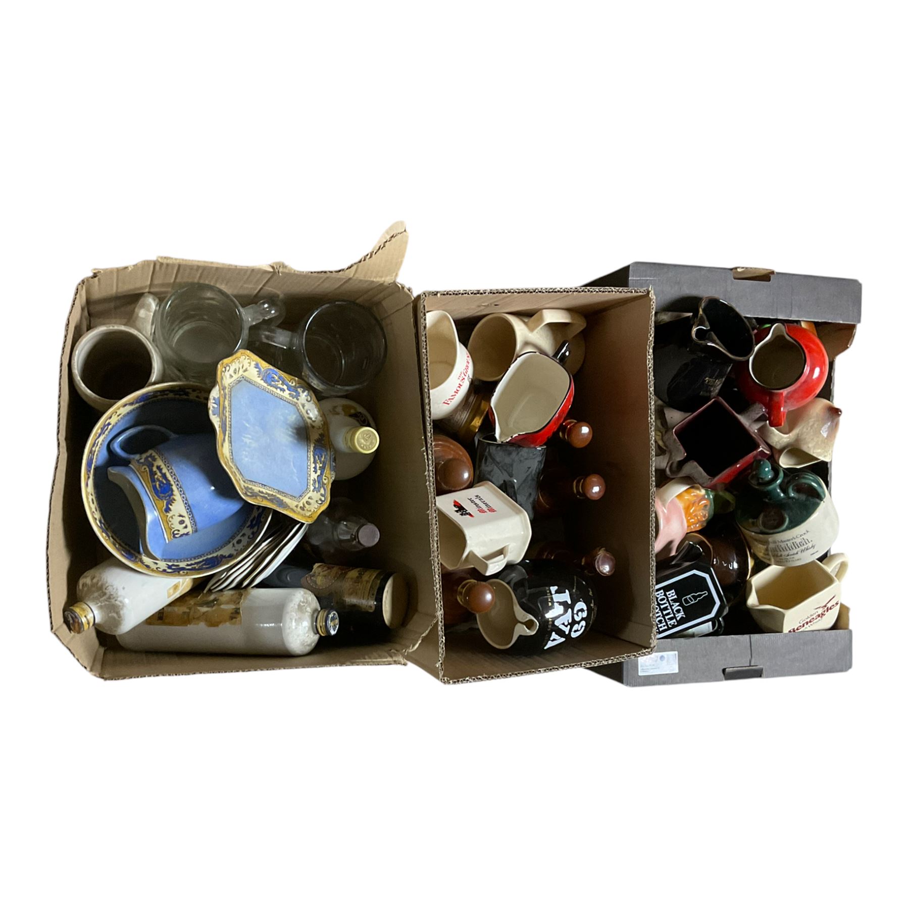 Collection of Wade Bells decanters, together with whisky jugs, charatacture jugs etc in three boxes 